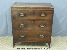 A Georgian mahogany bachelor's chest of three graduated drawers raised on bracket feet (W76 x D44 x