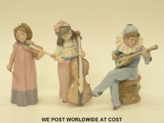 Three Nao child musician figures