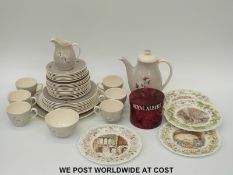 A Royal Doulton tea set in Frost Pine pattern and four Brambly Hedge plates