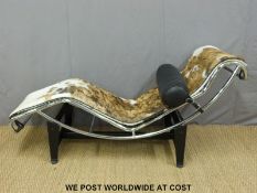A Le Corbusier style chaise longue with hide cover,