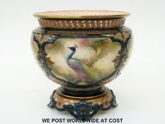 Hadley's Worcester pedestal bowl decorated with peacocks (15cm tall,