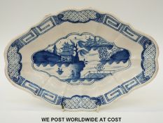 An 18thC Worcester fluted lozenge shaped dish painted in underglaze blue with chinoiserie pattern