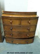 A 19thC mahogany bow front chest of two over three graduated drawers (H102cm x W102cm x D54cm)