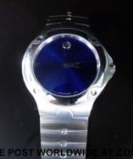 Movado gentleman's wristwatch with stainless steel hands and 12 marker and cobalt blue face,