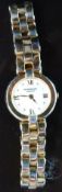 Raymond Weil gold plated ladies wristwatch with white face, Roman numerals and gold hands,