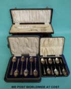 A collection of cased cutlery to include fish knives and forks, a fruit spoon set, fish servers,