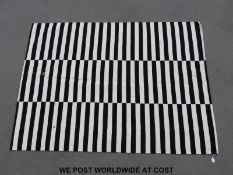 A modern zebra crossing style rug (240 x 175cm)