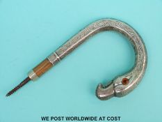 An early 20th century hallmarked silver novelty walking stick handle formed as a flamingo,