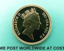 A 1985 proof gold half sovereign cased