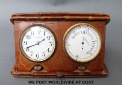 An 8 day crocodile leather cased Swiss travelling clock and barometer compendium, J.C.
