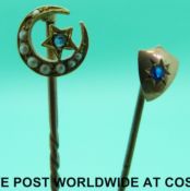 A Victorian stick pin marked 18ct gold set with seed pearls and a sapphire in the form of a