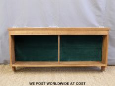 An oak glazed wall hanging display cabinet with interior electric light (W140 x D22 x H68cm)