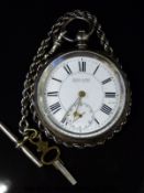 Kendal and Dent Buren continental silver pocket watch with inset subsidiary seconds dial and key