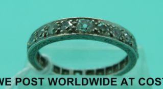 An Art Deco platinum eternity ring set with graduated diamonds (size P)