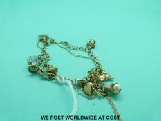 A 9ct gold charm bracelet (9.