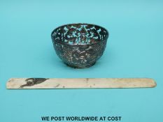 A Chinese export white metal pierced bowl with dragon decoration by Wang Hing (diameter 8cm weight