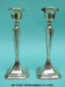 A pair of hallmarked silver candlesticks, Birmingham 1915,