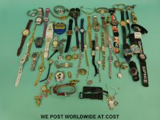 Over 50 various ladies and gentleman's wristwatches including Gucci.