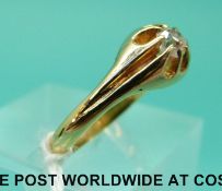 An 18ct gold ring set with an old cut diamond (size O)