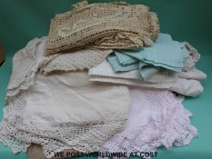 A box of various textiles,