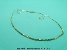 A 9ct gold chain (2.