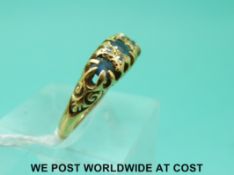An 18ct gold ring set with sapphires and diamonds (size O)