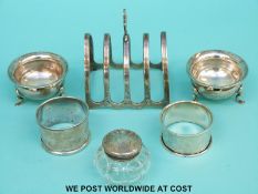 A hallmarked silver five bar toast rack,