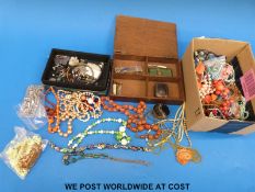 A quantity of costume jewellery to include beaded necklaces, malachite necklace, agate casket,