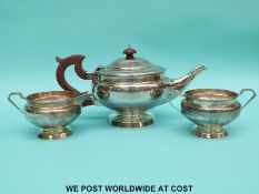 A George V hallmarked silver three piece tea set, Birmingham 1929 maker William Neale and Son Ltd.