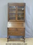 A glazed oak bureau bookcase with adjustable shelving (W95 x D47 x H201cm)