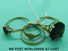 Two 9ct gold rings one set with smoky quartz, silver ring,