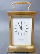 A late 20th century carriage clock in gilt brass case,