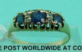 A Victorian ring set with three sapphires and diamonds (size O)