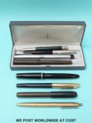 Eight Parker and other pens to include a Parker Duofold with 14ct gold nib and yellow metal