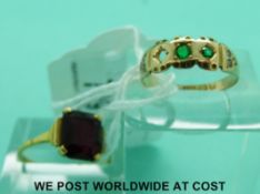 A hallmarked 15ct gold ring (size K) and a yellow metal ring marked 9ct gold (size Q)