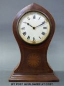 A c1900 balloon style cased mantel timepiece with shell inlay decoration to case, enamelled dial,