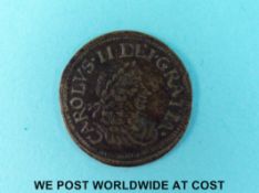 Charles II brass token of a maundy 2d,