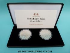 Cased first and last US Peace silver dollars with certificate of authenticity