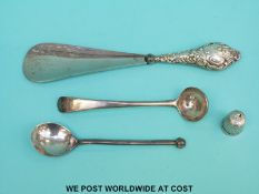A Georgian hallmarked silver mustard spoon, oriental white metal spoon,