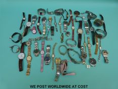 Over 50 various ladies and gentleman's wristwatches including Sekonda, vintage Timex, Swatch etc.