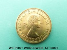 A 1965 Elizabeth II first head gold full sovereign