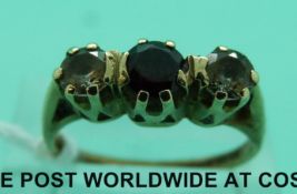 A 9ct gold ring set with paste (size P)