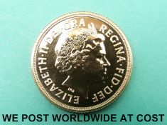 A 2015 gold full sovereign with certificate of authenticity