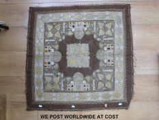 Three finely embroidered wall hangings to include an example with an Indian style temple