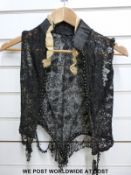 A late Victorian ladies waistcoat finished with black beads