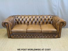 A brown leather Chesterfield button back three seater sofa (L212 x D90 x H63cm)