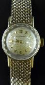 Morado 18ct gold ladies wristwatch with gold hands and markers, on 9ct gold bracelet,