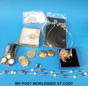 A collection of costume jewellery including a silver and pearl necklace