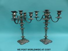 A pair of five branch silver plated candelabra,