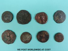 Eight unidentified ancient coins including Roman